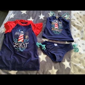 Girls bathing suit three pieces.